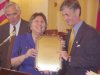 Buck Gillispie award being presented by Carol Gillispie to Congressman John M. McHugh. Richard Schneider is pictured in the background.