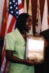 Angela E. Walker, L.P.N. Nursing Strategic Healthcare Group Department of Veterans Affairs, Washington, D.C. receiving her George Alexander Memorial Volunteer Service Award.
