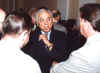 Everett Alvarez, held prisoner in Vietnam for  8 1/2 years, talking with unidentified guests.