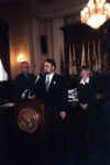 Jan Broucinek accepting his George Alexander Volunteer Service Award. To his left is Jack Smith, to his right is the presenter, Ann Marie Alexander.